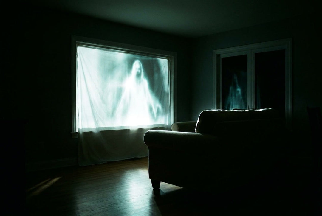 A dark living room with a ghost projected onto the window sheet